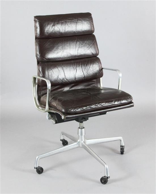 A Charles and Ray Eames EA216 soft pad high back swivel armchair, W.1ft 10in. H.3ft 6in.